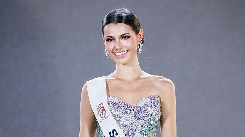 Cô gái mắc chứng khó đọc thành á hậu Miss World