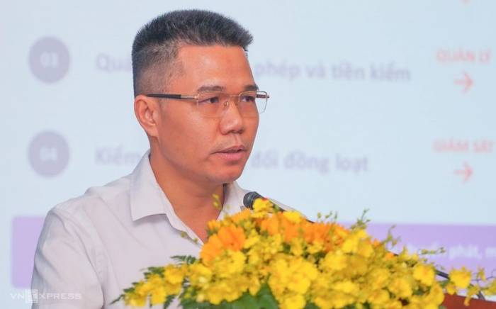 Ông Lê Văn Chung, đại diện Vụ Bưu chính - Bộ Khoa học và Công nghệ, phát biểu tại sự kiện. Ảnh: Bảo Lâm