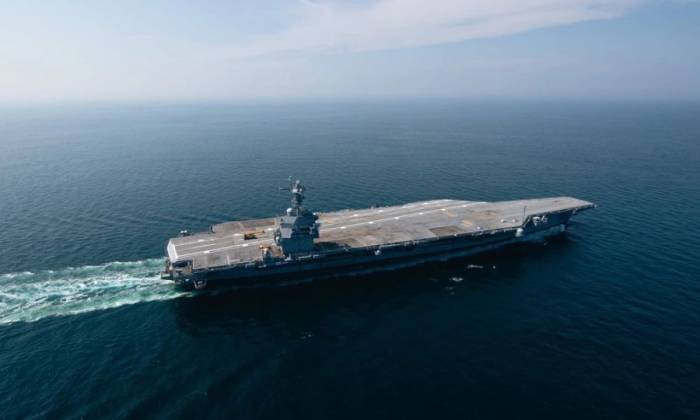 Tàu sân bay USS John F. Kennedy chạy thử trên biển trong ảnh công bố ngày 15/8. Ảnh: HII