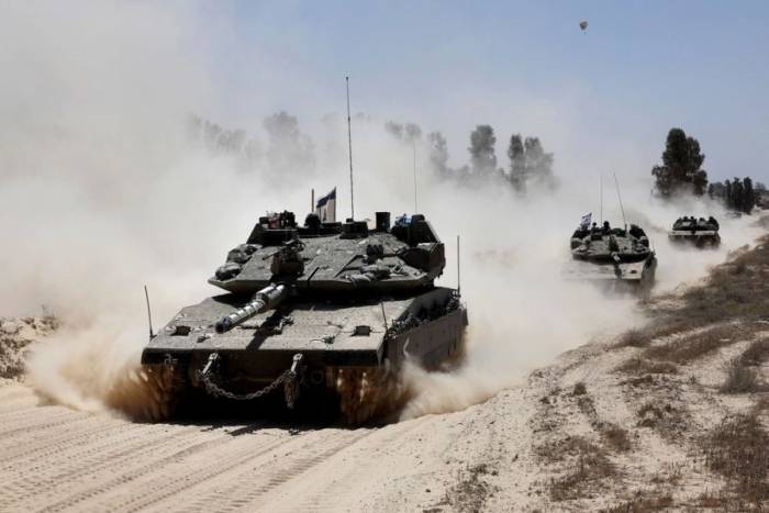 Xe tăng quân đội Israel ở khu vực tiếp giáp Dải Gaza ngày 20/5/2025. Ảnh: AFP