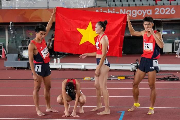 Lê Ngọc Phúc, Nguyễn Thị Ngọc, Quách Thị Lan và Tạ Ngọc Tưởng (từ trái sang) giành HC đồng chạy tiếp sức 4x400m hỗn hợp nam nữ ASIAD 2026, tại sân Paloma Mizuho, Nagoya, Nhật Bản ngày 24/9/2026. Ảnh: AP