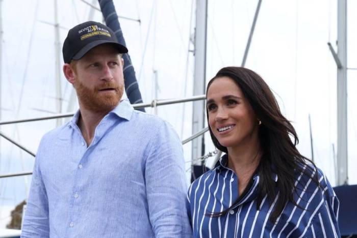 Vợ chồng Harry - Meghan tại Sydney, Australia, ngày 17/4. Ảnh: Reuters