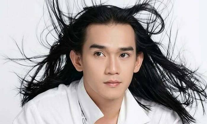 Mái tóc dài gắn liền với Minh Thuận lúc sinh thời. Ảnh: Gia đình cung cấp