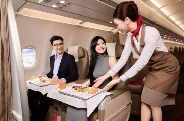 Hành khách trên chuyến bay Sun PhuQuoc Airways. Ảnh: SPA