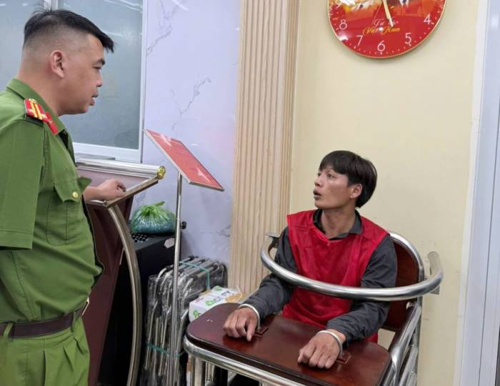 Nguyễn Văn Tuấn tại cơ quan điều tra. Ảnh: Công an TP HCM