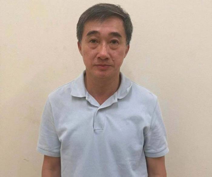 Thứ trưởng Trần Văn Thuấn lúc bị bắt. Ảnh: Bộ Công an