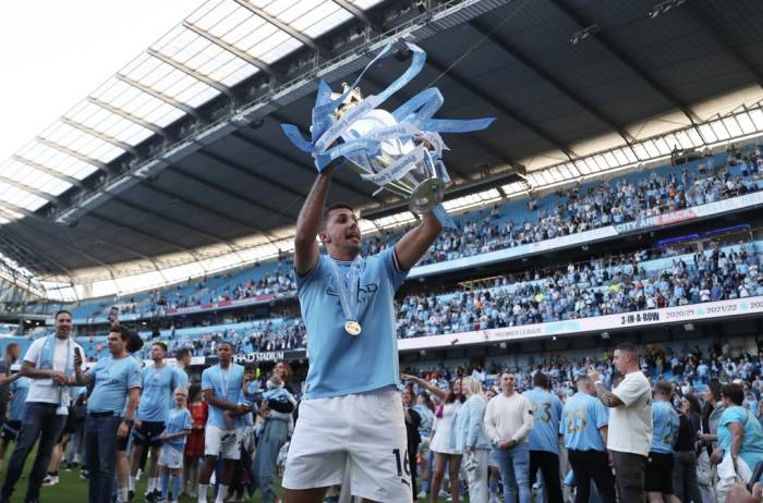 Rodri ăn mừng chức vô địch Ngoại hạng Anh trên sân Etihad, Manchester, Anh ngày 21/5/2023. Ảnh: Reuters