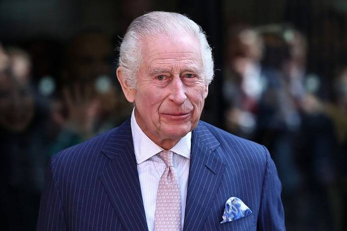 Vua Charles III tại Trung tâm Điều trị ung thư Macmillan ở London năm 2024. Ảnh: AFP