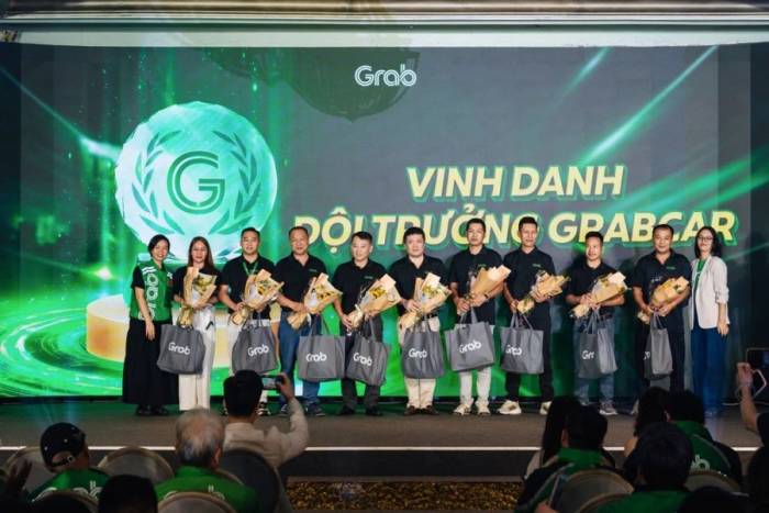 Những đội trưởng bền bỉ kết nối, sẻ chia kinh nghiệm và đồng hành cùng cộng đồng bác tài. Ảnh: Grab