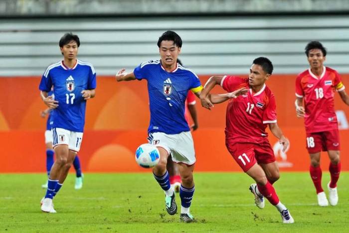 Nhật Bản (áo xanh) thắng Thái Lan 3-0 ở lượt cuối bảng A bóng đá nam ASIAD 2026 trên sân Toyota, Nhật Bản ngày 23/9/2026. Ảnh: ThailandNT