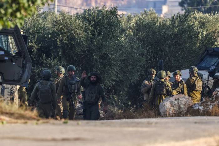 Binh lính Israel tại làng Aqraba thuộc khu Bờ Tây bị chiếm đóng hôm 8/9. Ảnh: AFP
