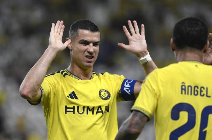 Ronaldo ăn mừng sau khi ghi bàn trong trận Al Nassr thắng Neftchi Fergana ở AFC Champions League Elite trên sân Al Awwal Park, Riyadh, Saudi Arabia ngày 12/10/2026. Ảnh: Reuters