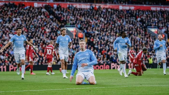 Erling Haaland trượt cỏ mừng bàn mở tỷ số trong trận Man City thắng Liverpool 3-0 ở vòng sáu Ngoại hạng Anh tại Anfield, thành phố Liverpool, Anh, ngày 11/10/2026. Ảnh: Man City
