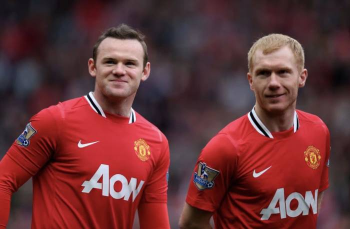 Wayne Rooney (trái) và Paul Scholes khi còn cùng thi đấu cho Man Utd. Ảnh: AFP