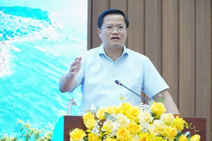 Ông Nguyễn Đức Tâm, Chủ tịch UBND tỉnh Quảng Ngãi cam kết cải thiện môi trường đầu tư. Ảnh: Phạm Linh
