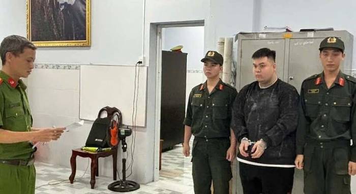 Tuấn bị bắt sau nhiều tháng lẩn trốn. Ảnh: Thái Hà