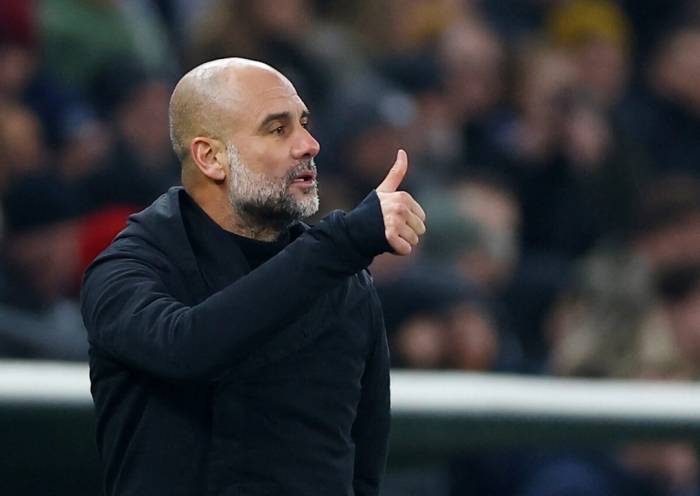 Pep Guardiola ở khu kỹ thuật trong trận Copenhagen – Man City ở vòng 1/8 Champions League trên sân Parken, Copenhagen, Đan Mạch ngày 13/2/2024. Ảnh: Reuters